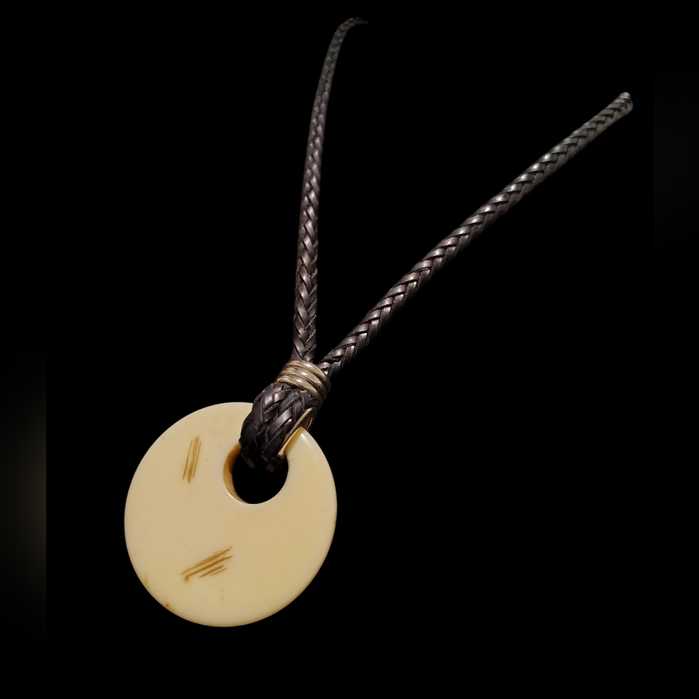 Braided Black Leather and Cream Doughnut Pendant Necklace